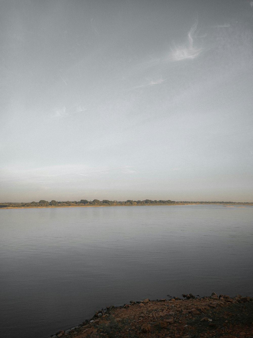 a body of water with a boat in it