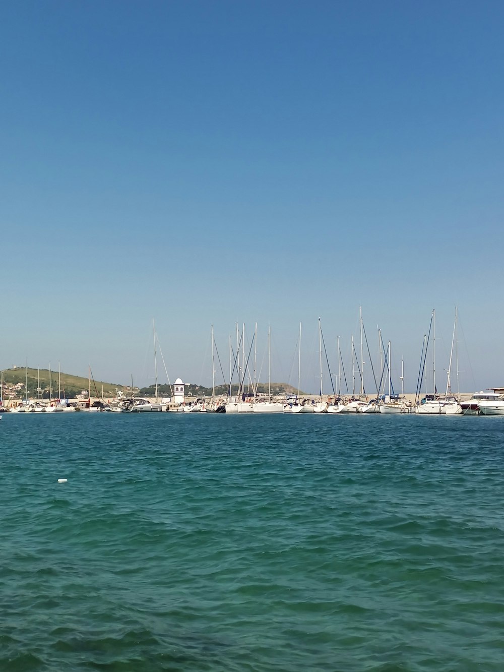 a body of water filled with lots of boats