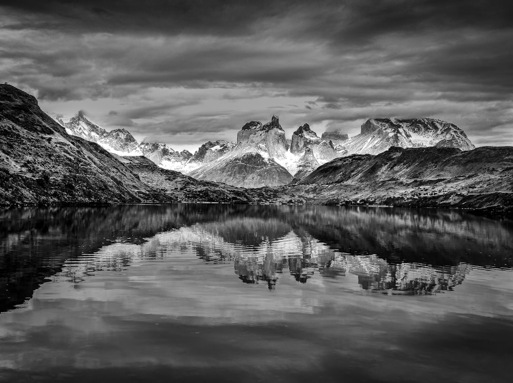 a black and white photo of a mountain range