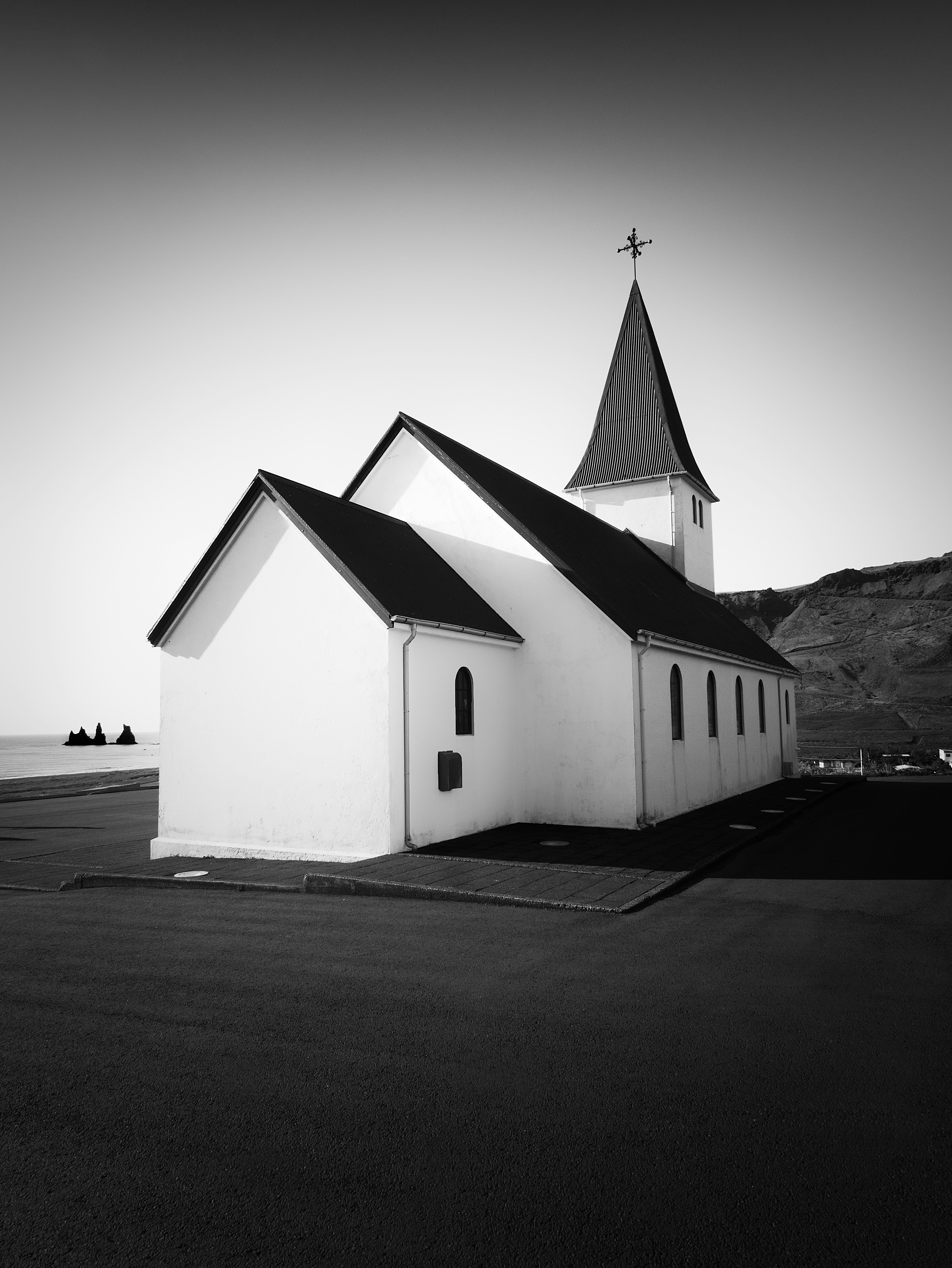 a black and white photo of a church