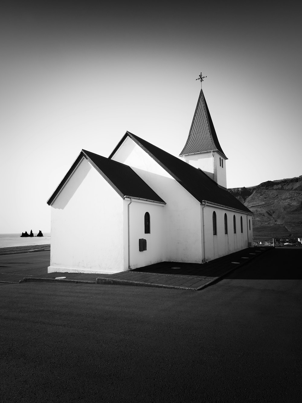 a black and white photo of a church