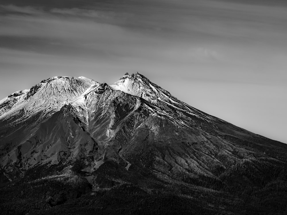 a black and white photo of a mountain