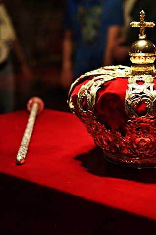 a crown sitting on top of a red table
