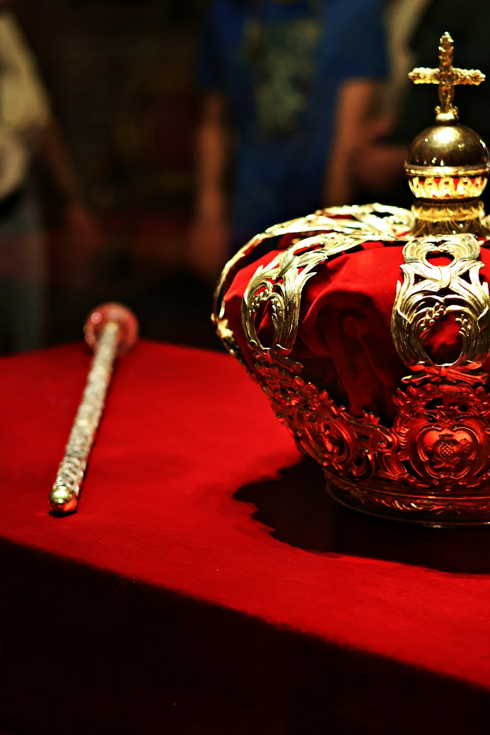 a crown sitting on top of a red table