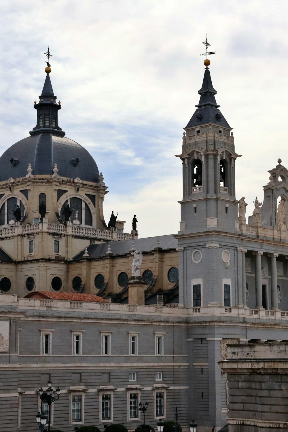 a large building with two towers and a clock