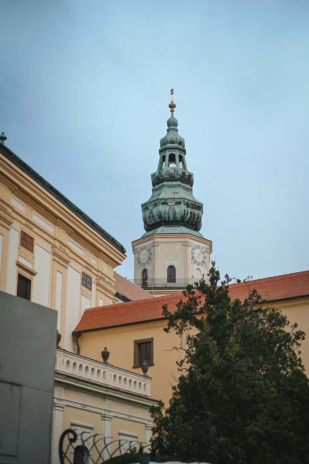 a tall building with a clock on the top of it