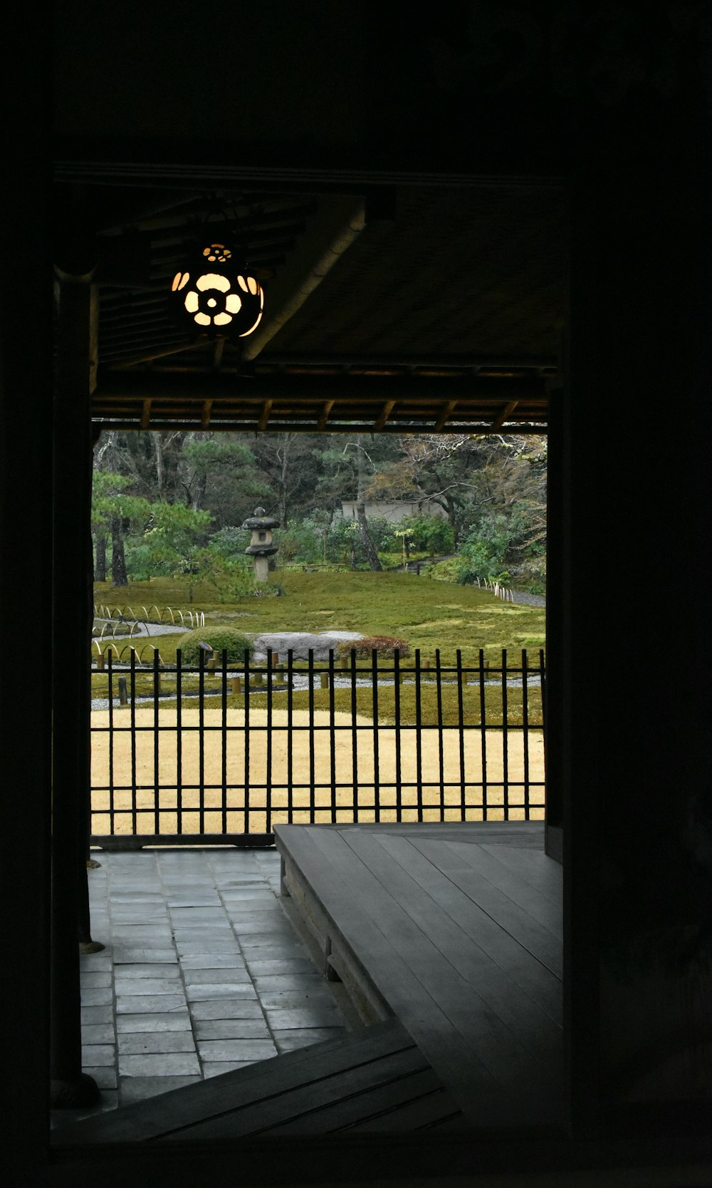 an open door with a view of a park