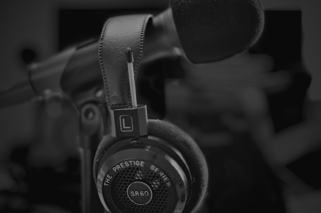 a pair of headphones sitting on top of a table,