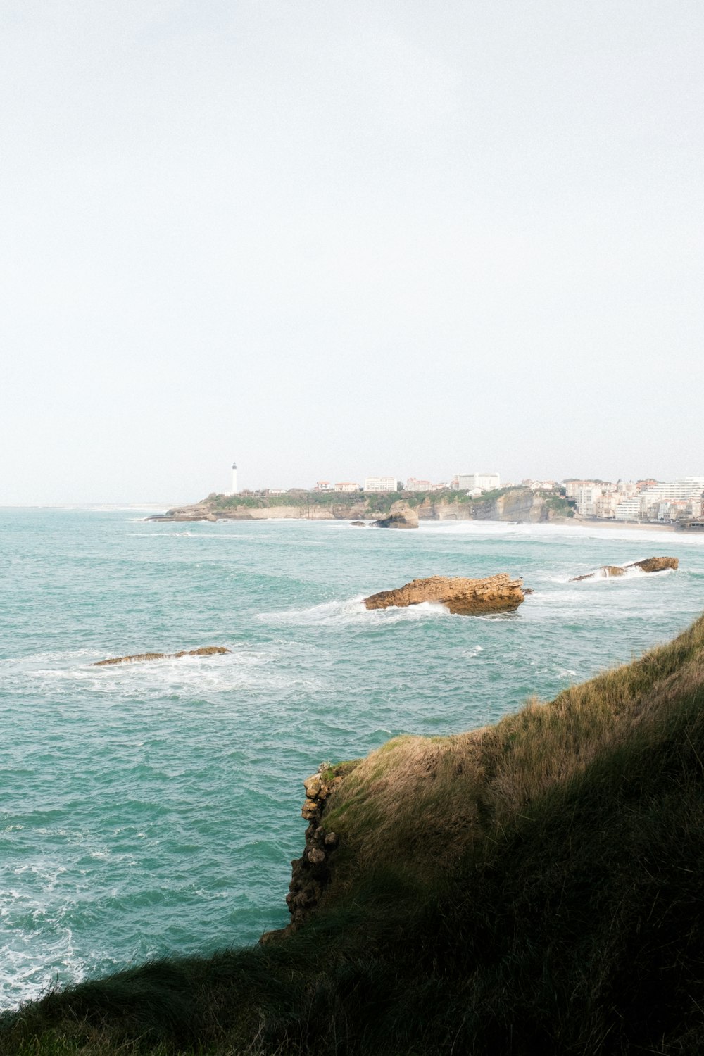 a view of the ocean from a cliff