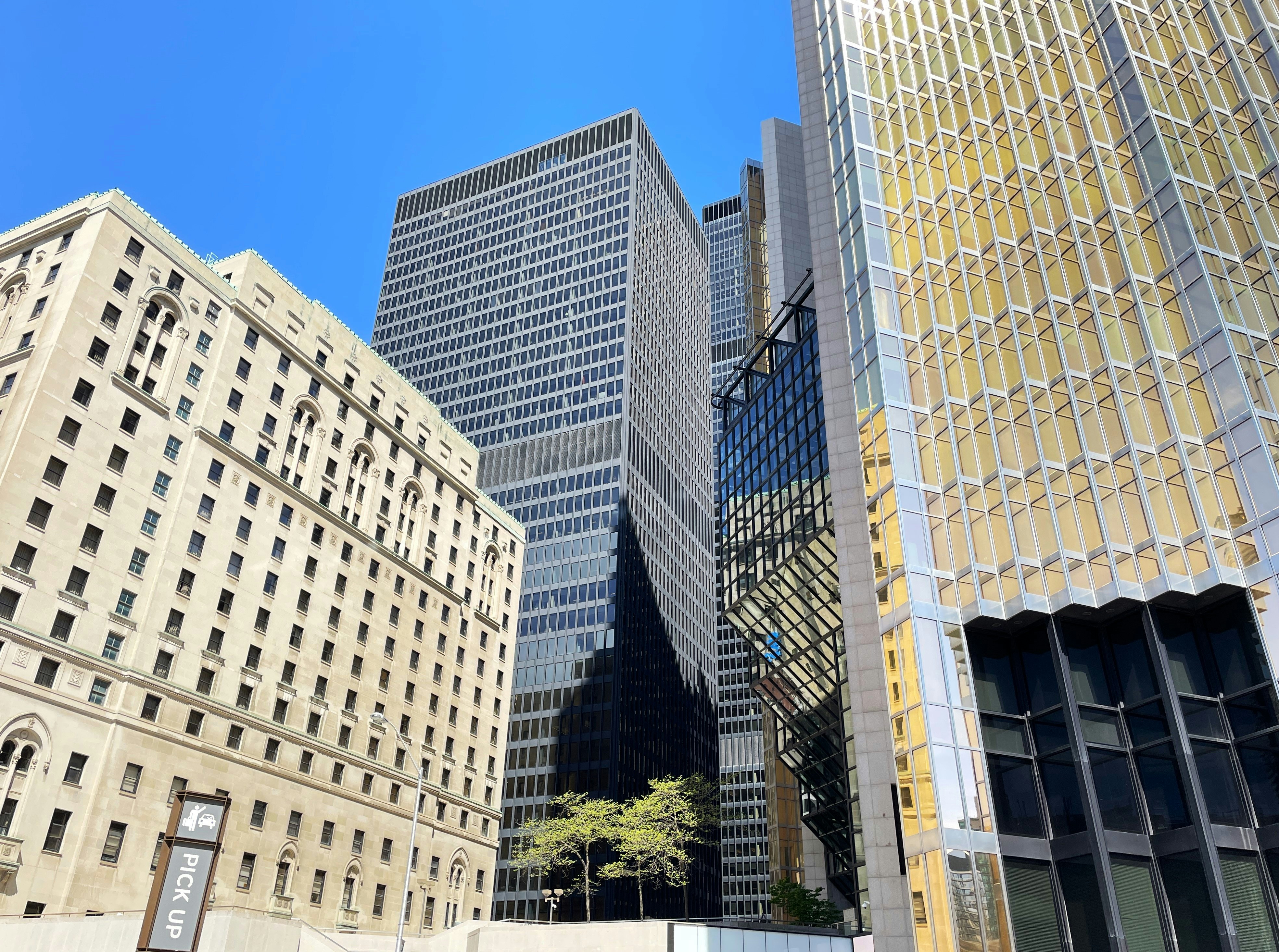 a group of tall buildings sitting next to each other