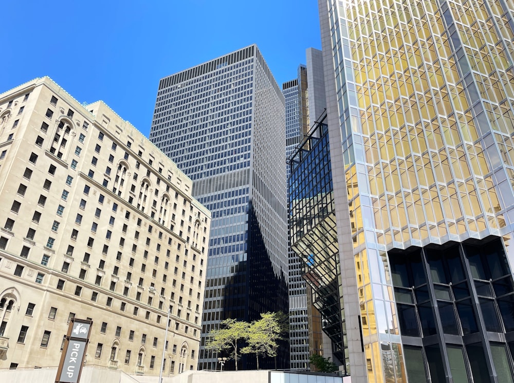 a group of tall buildings sitting next to each other