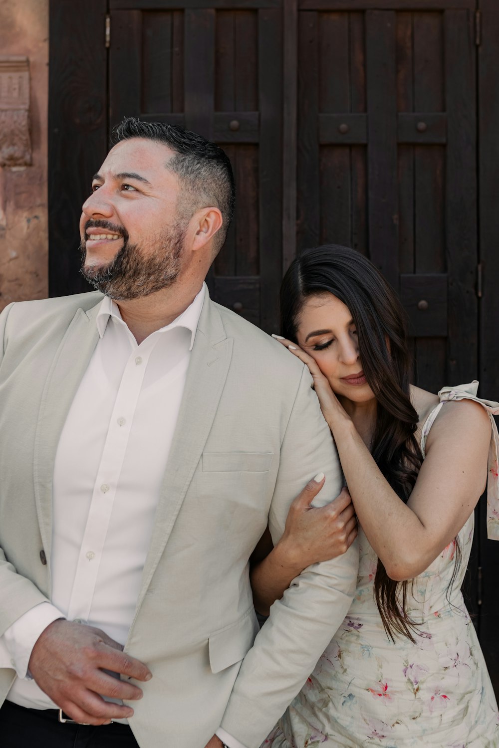 a man and a woman standing next to each other