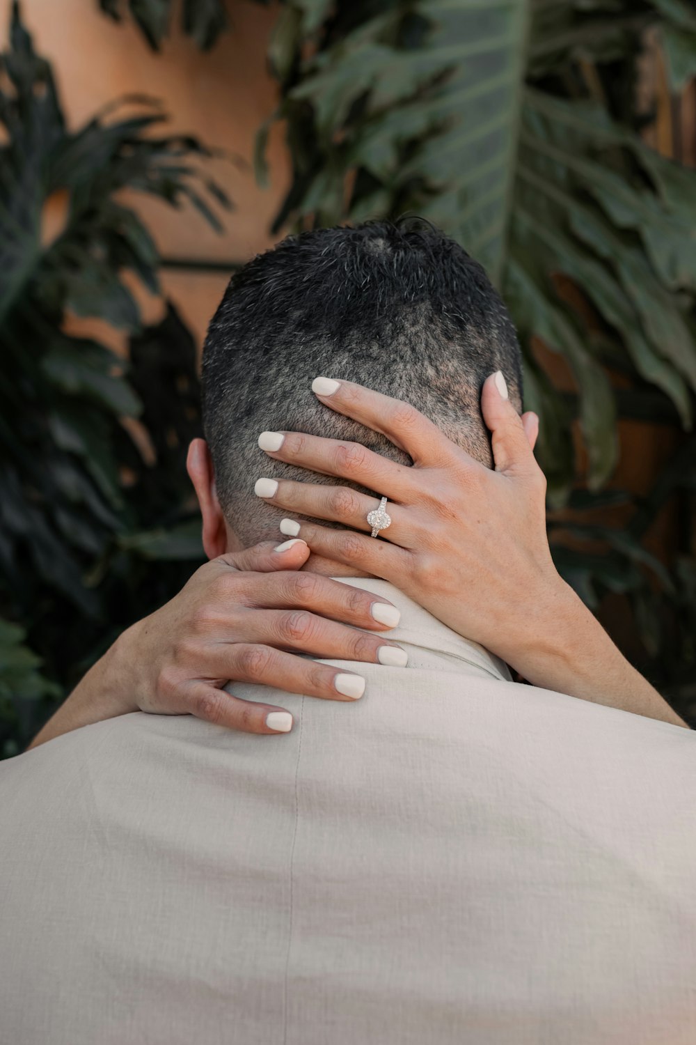 a man and a woman embracing each other