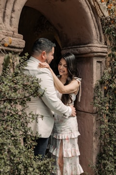 a man and a woman standing in a doorway