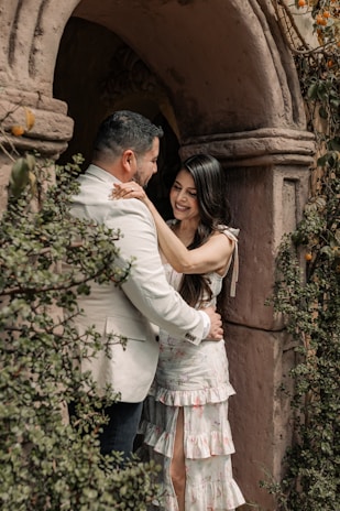 a man and a woman standing in a doorway