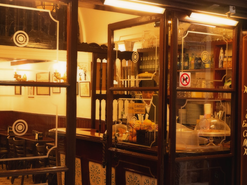 a display case in a restaurant filled with lots of food