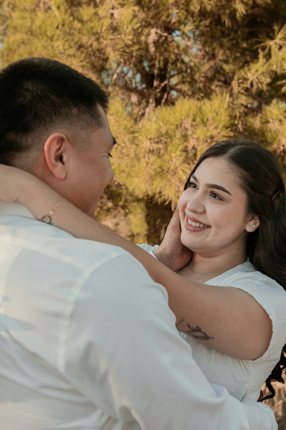 a man holding a woman in his arms