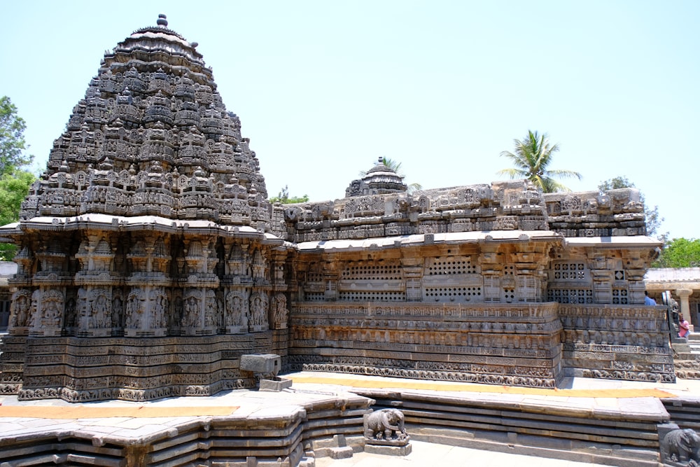 a large stone structure with sculptures on it