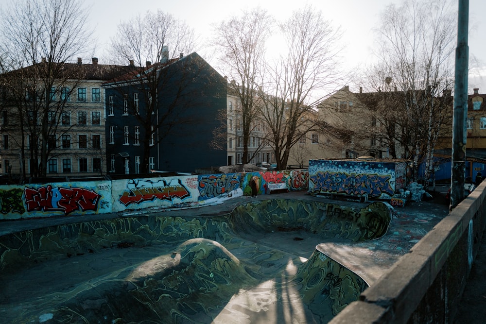 a skateboard park with graffiti all over it