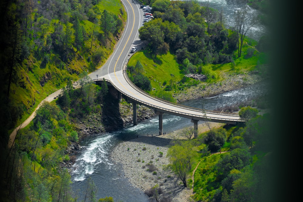 an aerial view of a bridge over a river