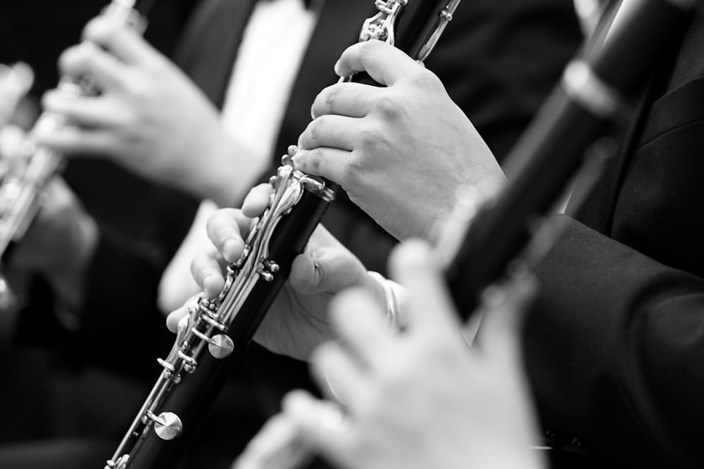 a group of people playing musical instruments together