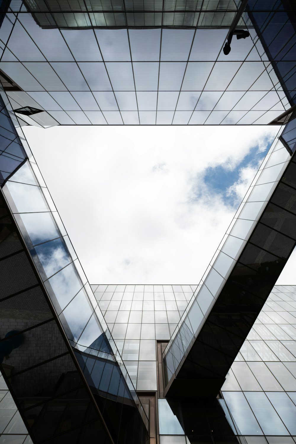 a very tall building with a sky in the background