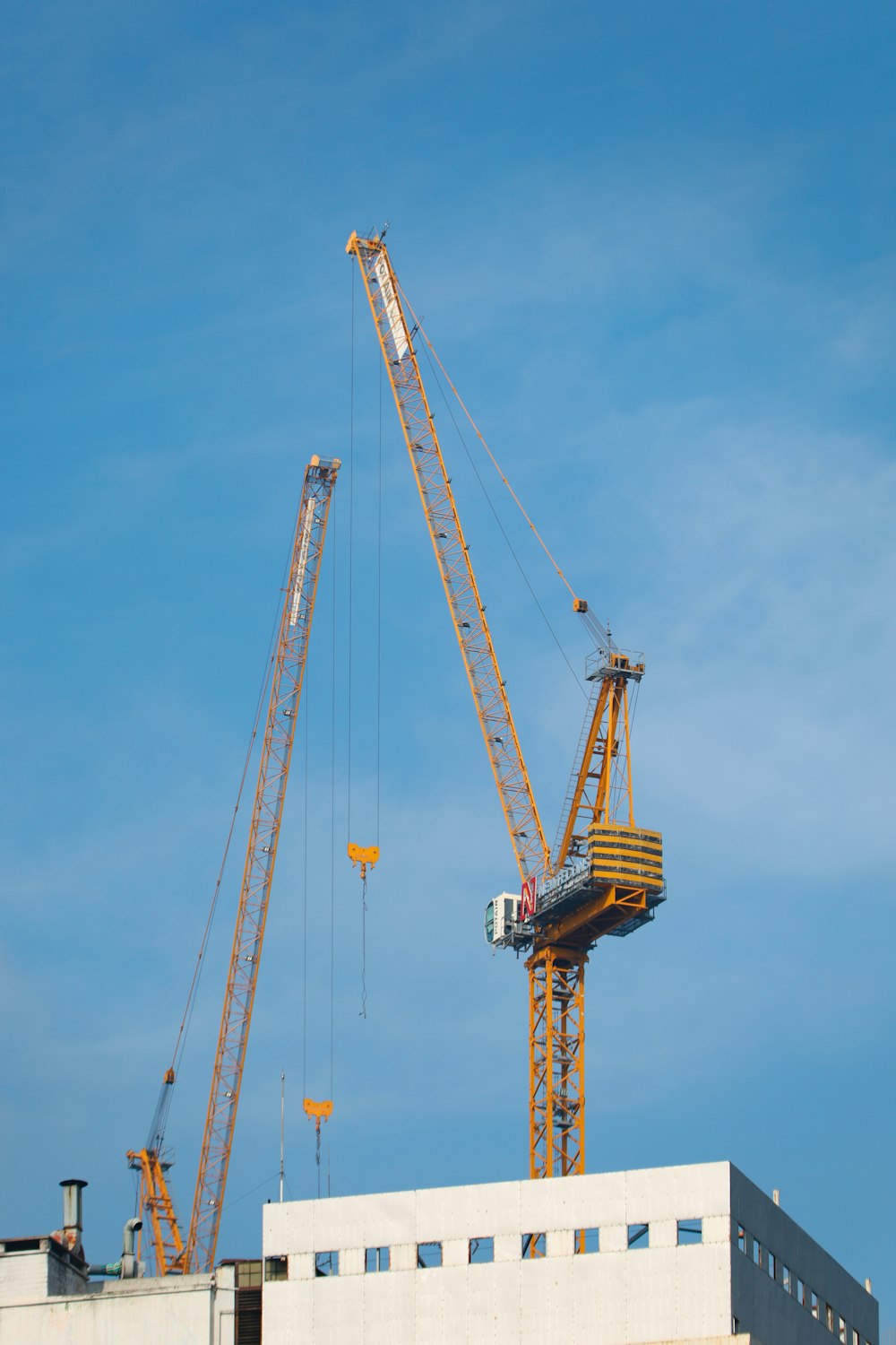 a crane that is on top of a building