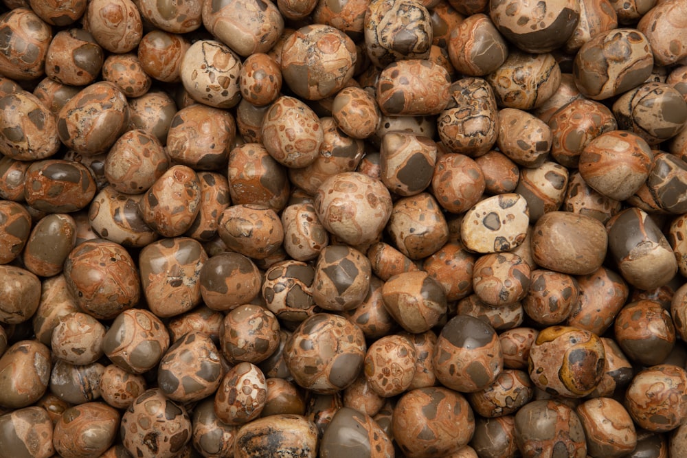 a large pile of brown and black rocks