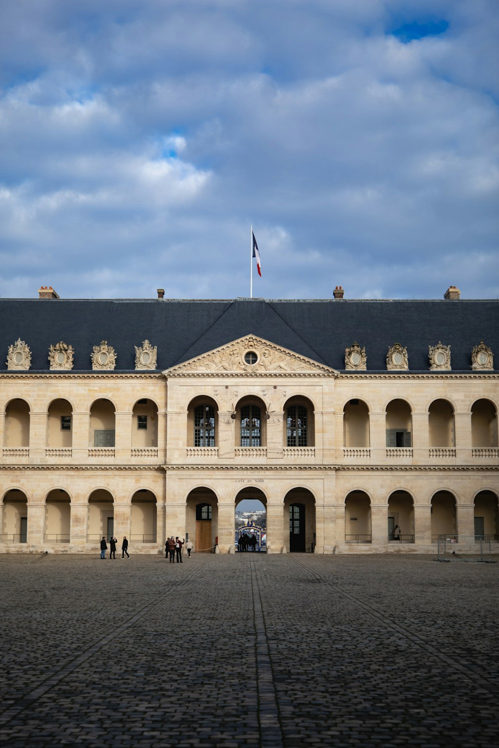 a large building with a flag on top of it