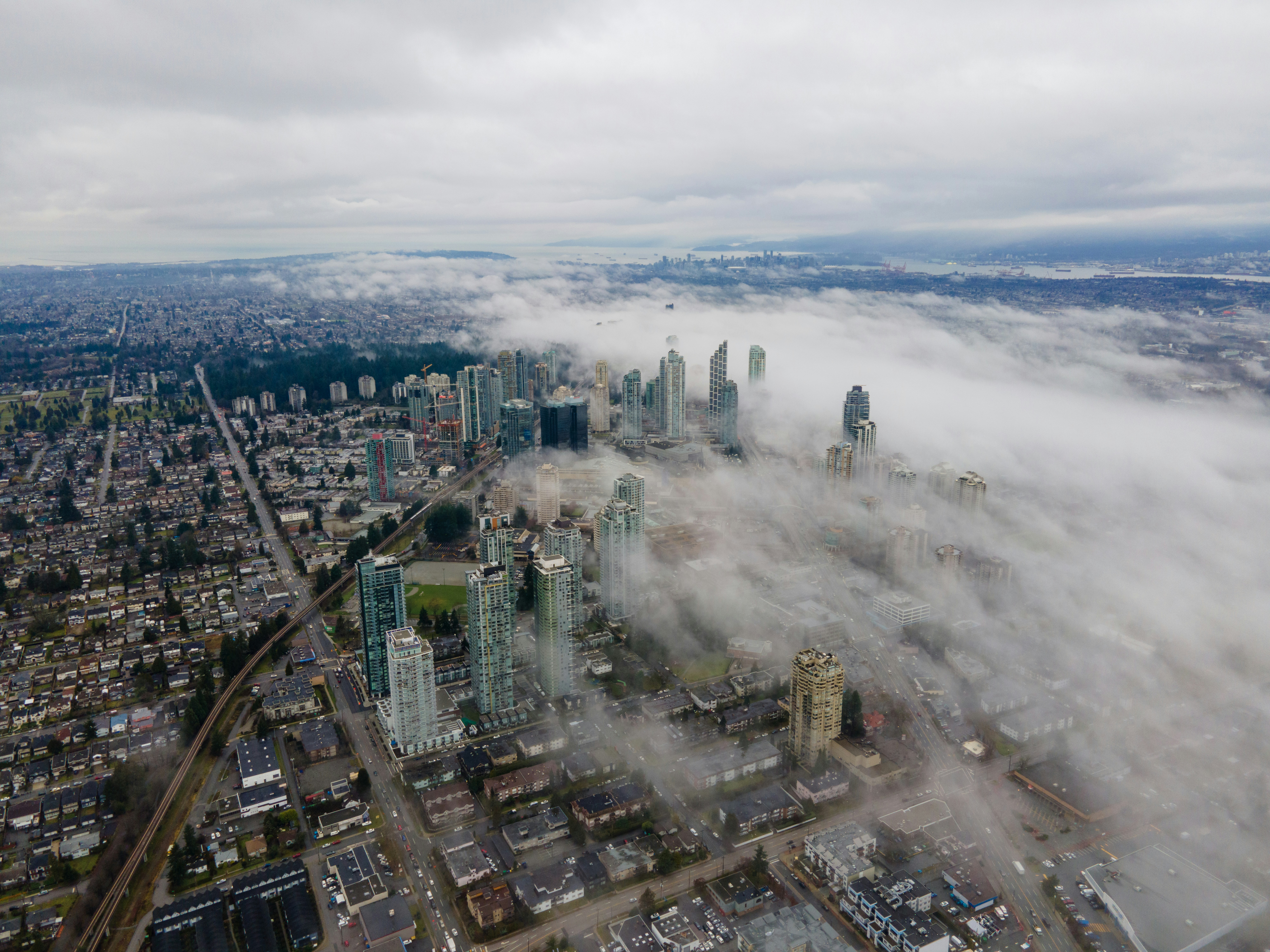 An aerial view of a city in the clouds photo – Free City Image on Unsplash