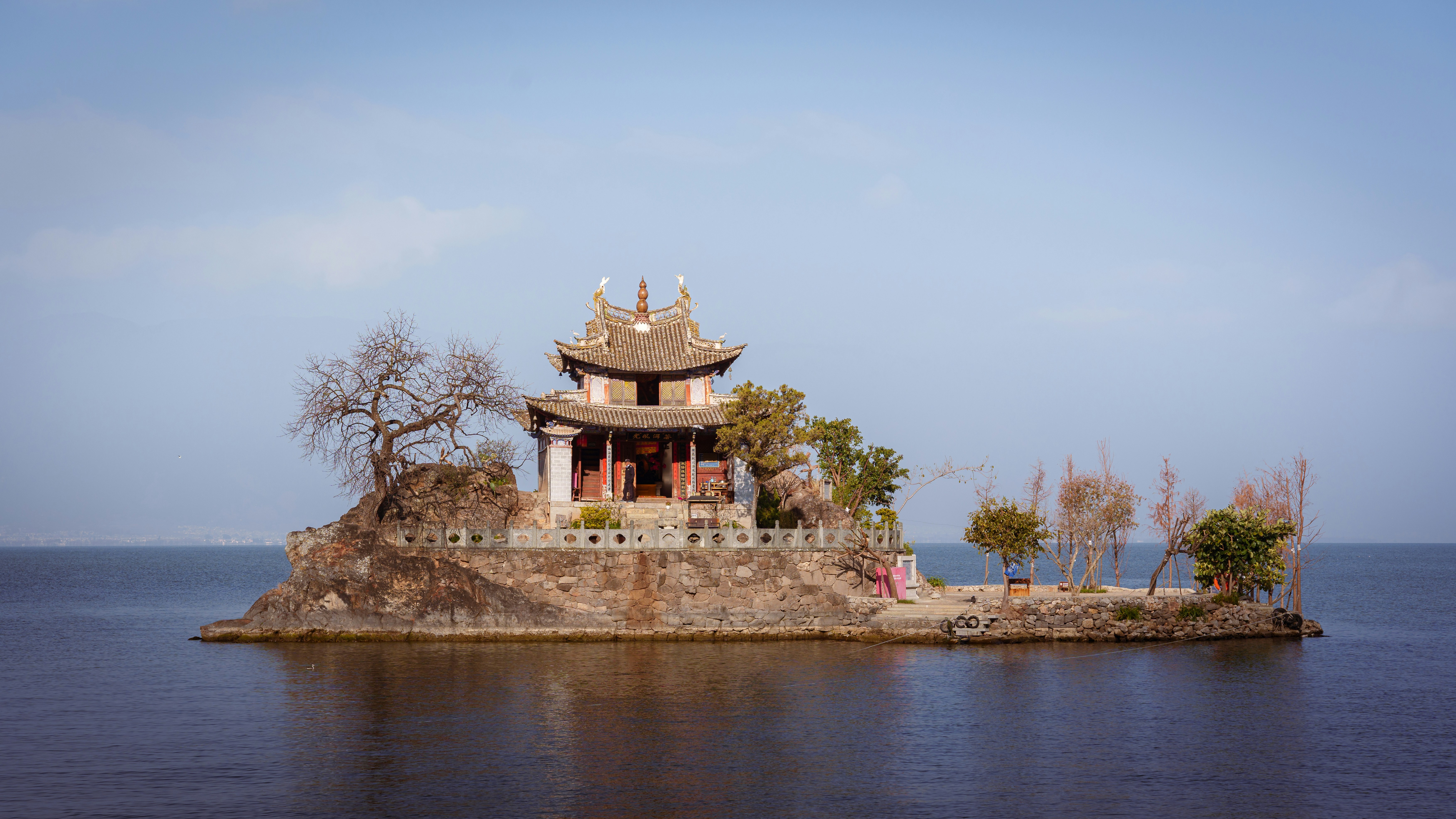 a small island in the middle of a body of water