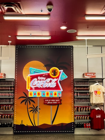 a coca - cola advertisement is displayed in a store