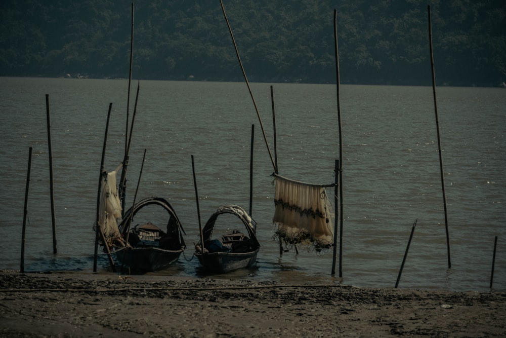 a couple of boats that are sitting in the water