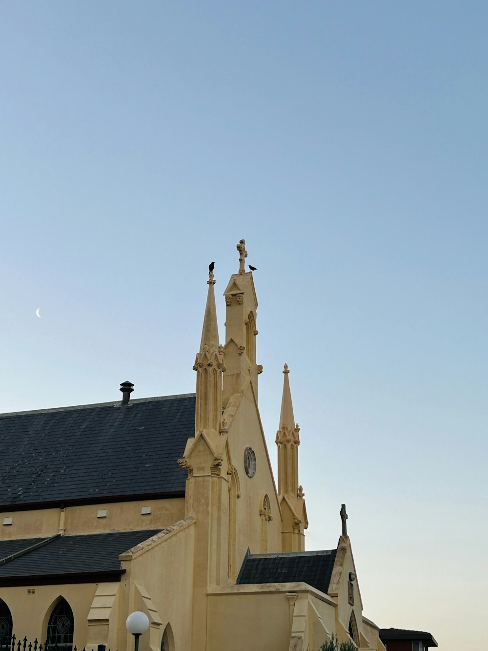 a church with a clock on the front of it