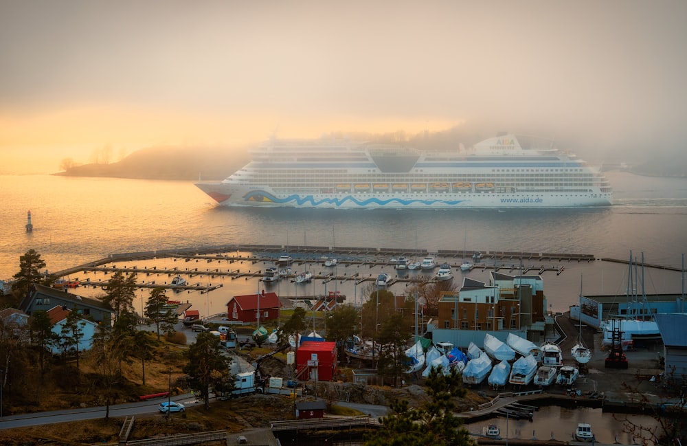 a cruise ship is docked in a harbor