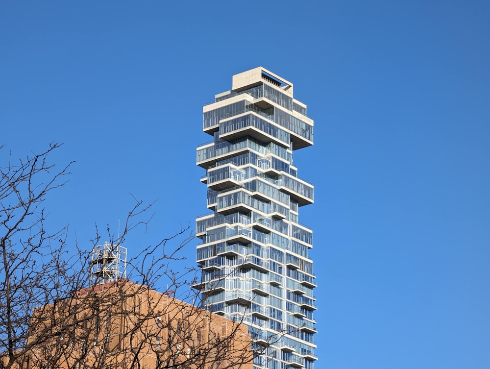 a tall building with a lot of windows on top of it