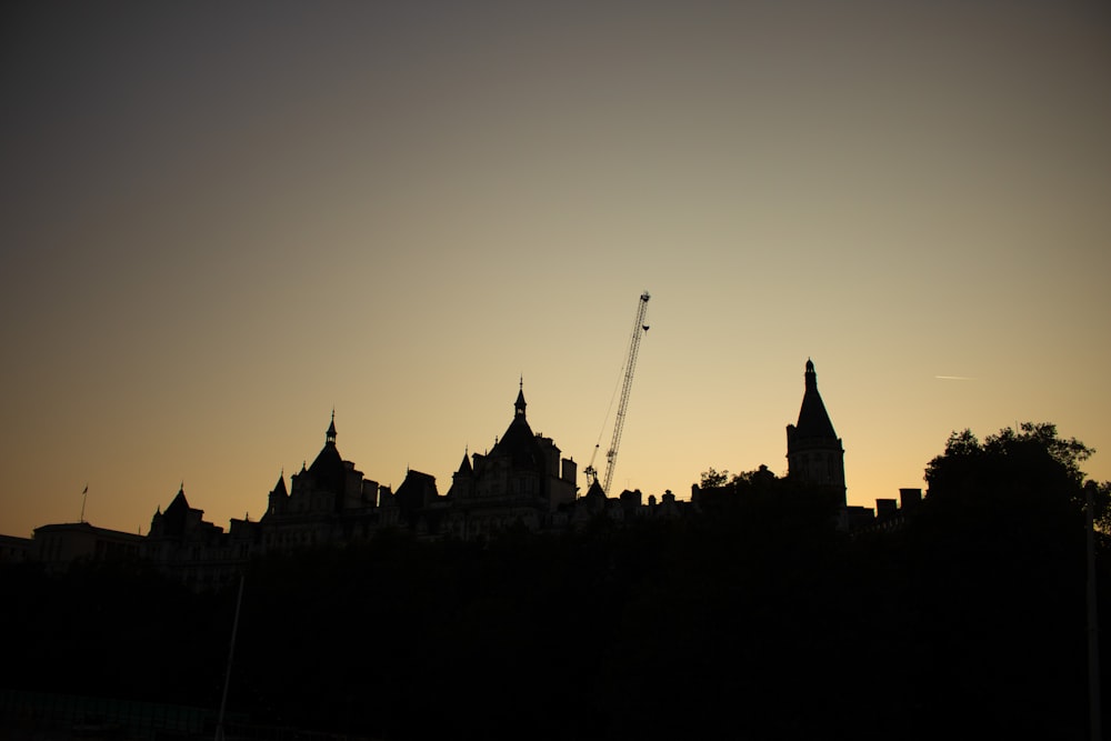 a view of a city skyline at sunset