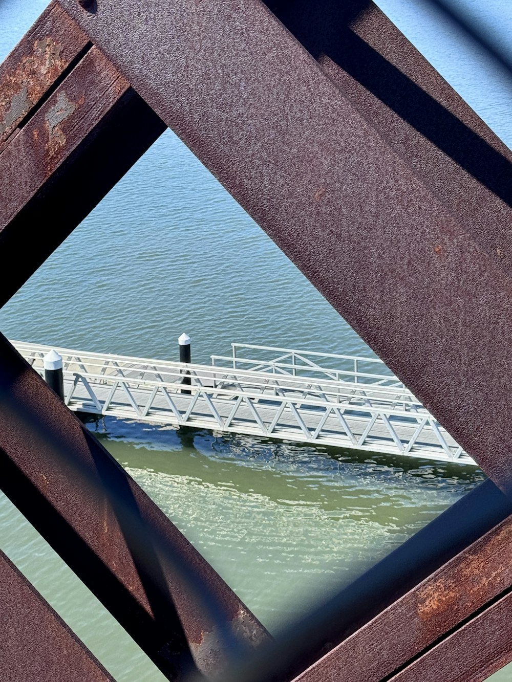 a view of a bridge over a body of water