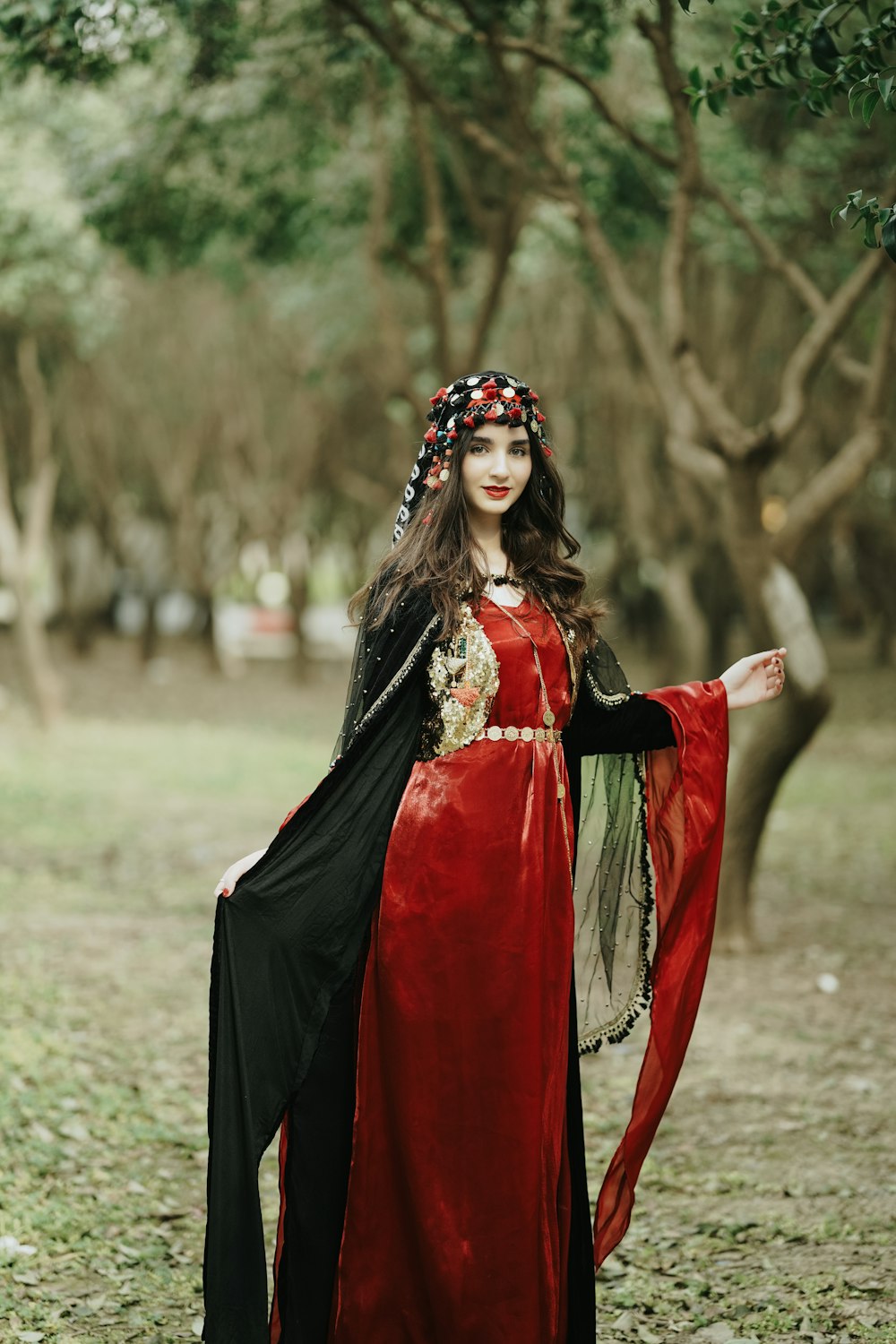 a woman in a red and black costume