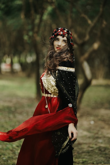 a woman in a red and black costume