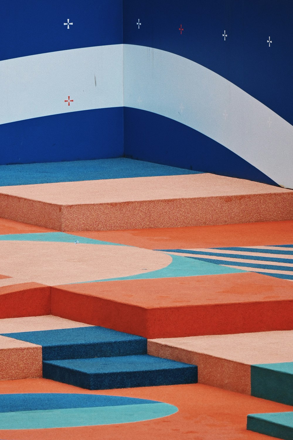 a person riding a skateboard on top of a set of steps