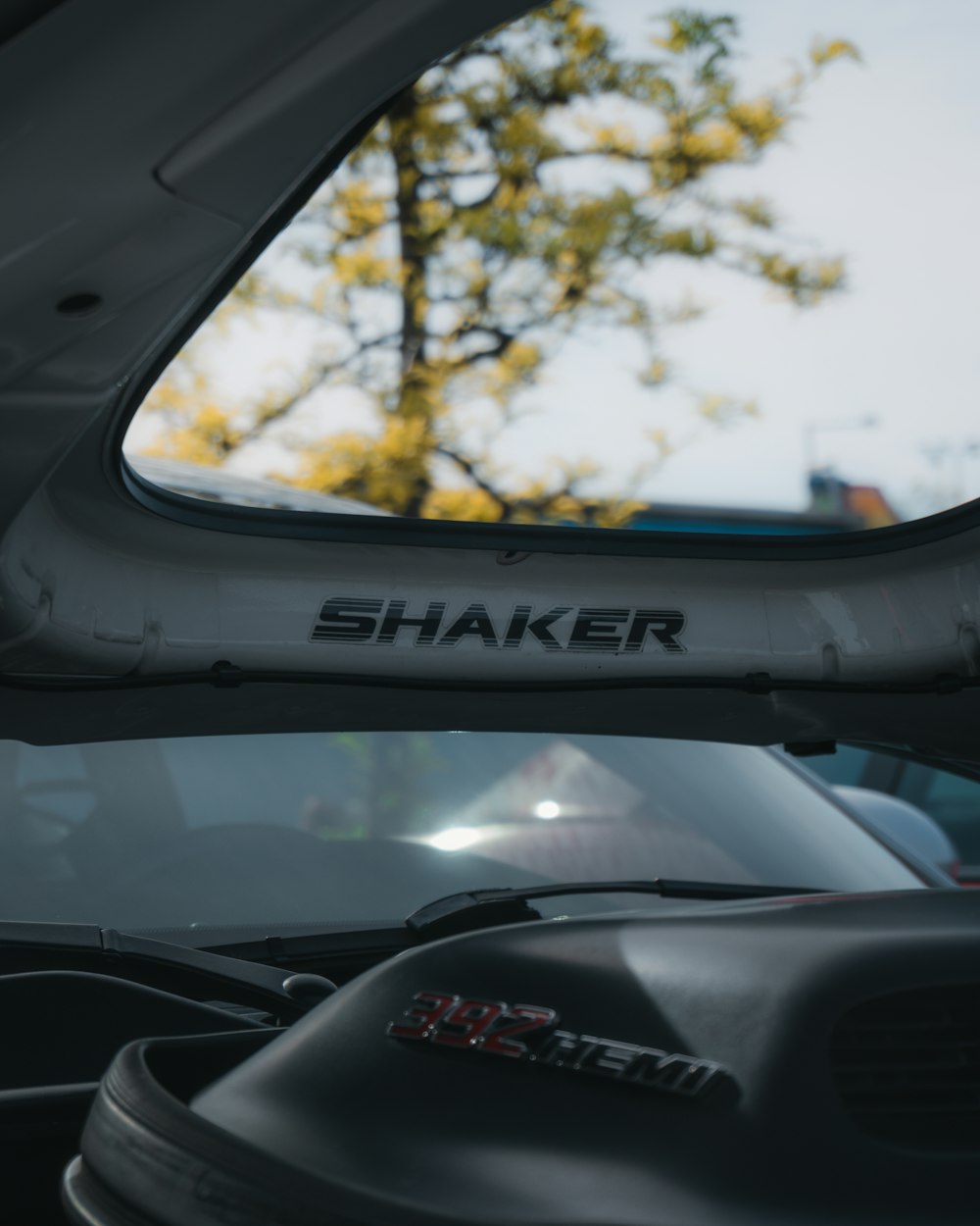 the rear view mirror of a car with the word shaker on it