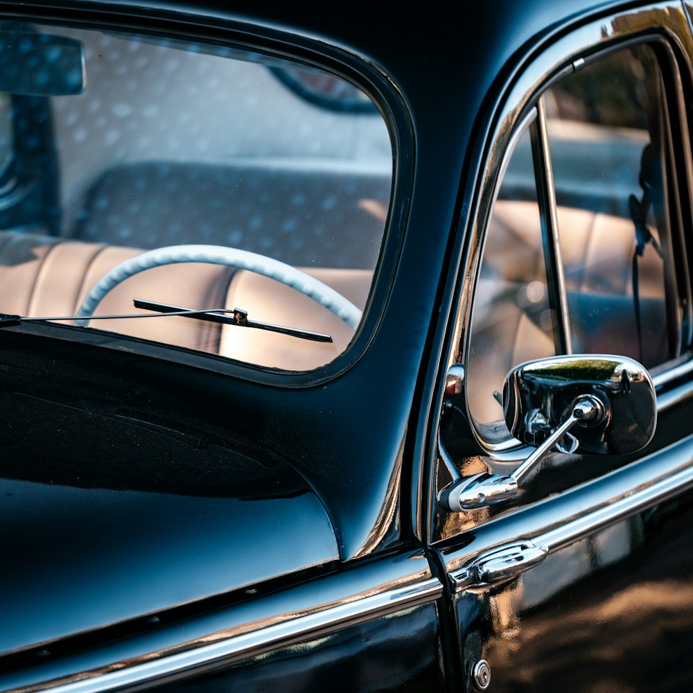 a close up of a car's side view mirror