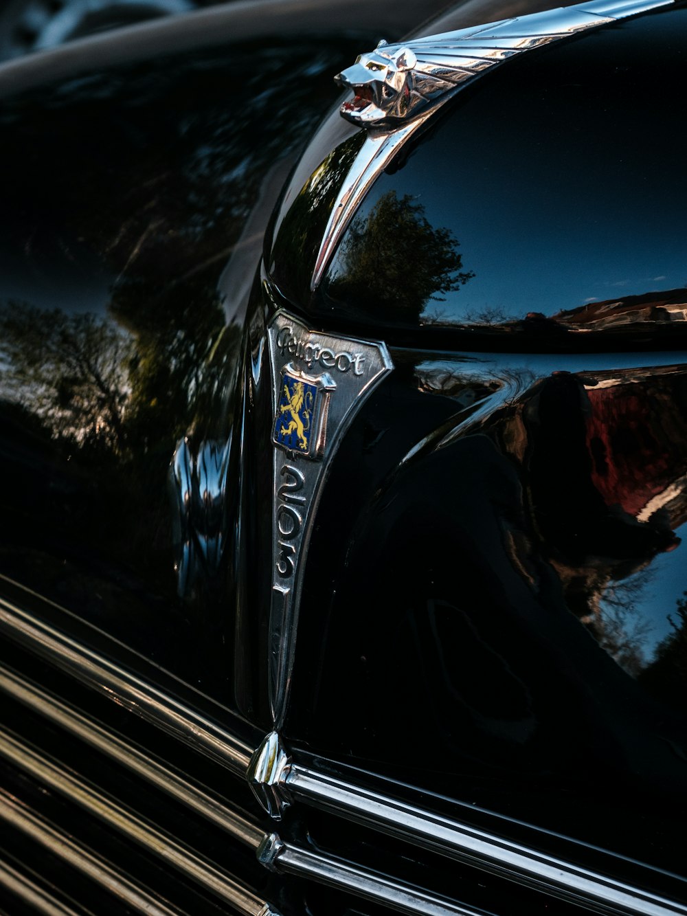 a close up of a car's hood ornament