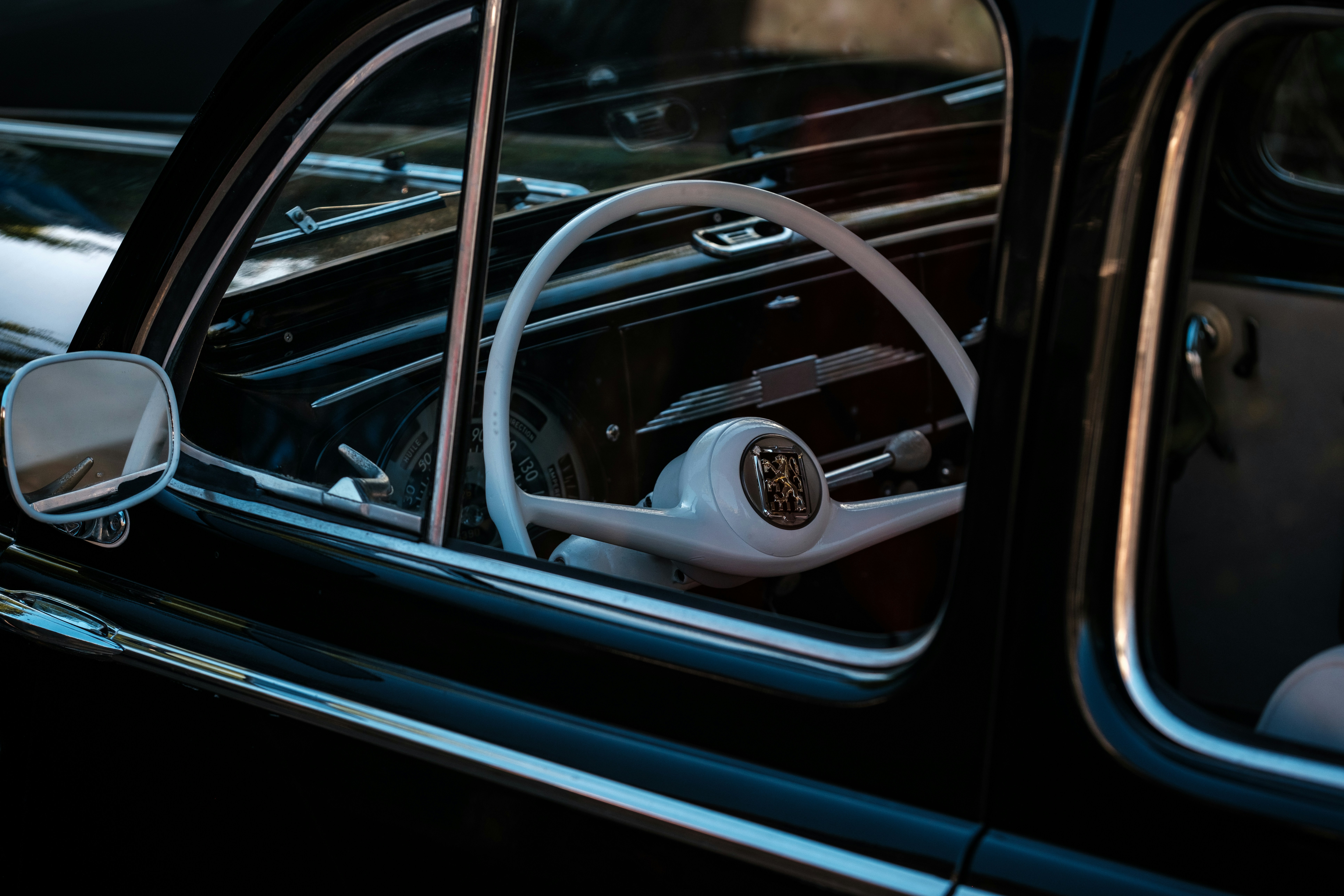 the interior of a car with a steering wheel