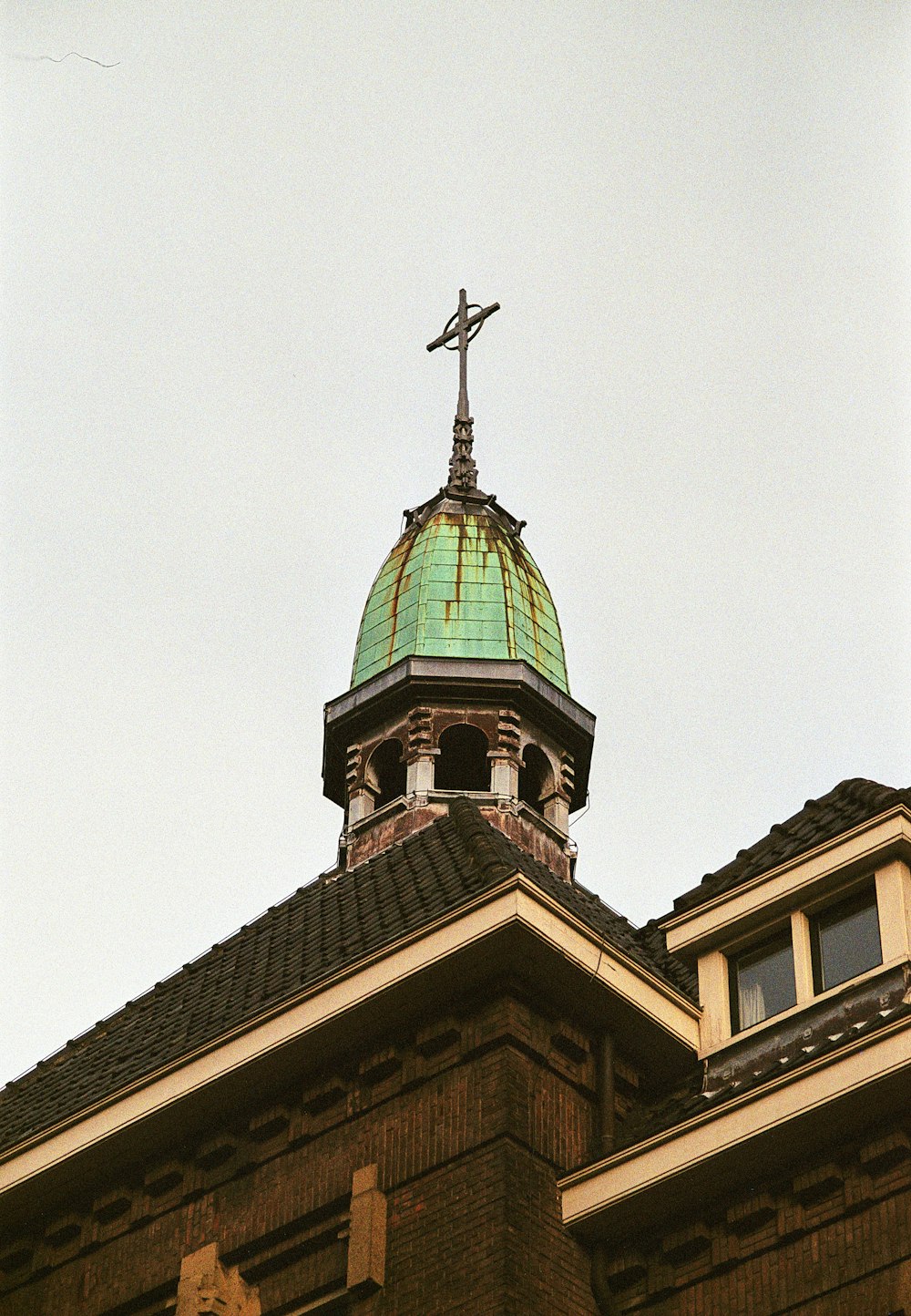 a green dome on top of a building