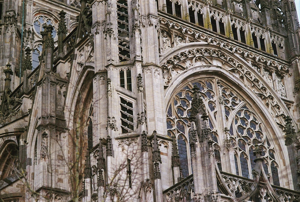 a large cathedral with a clock on the front of it