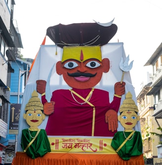 a large float of a man with a mustache