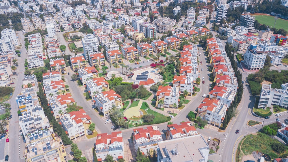 an aerial view of a city with lots of buildings