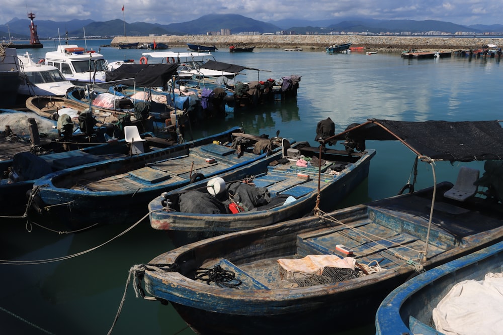 a bunch of boats that are sitting in the water